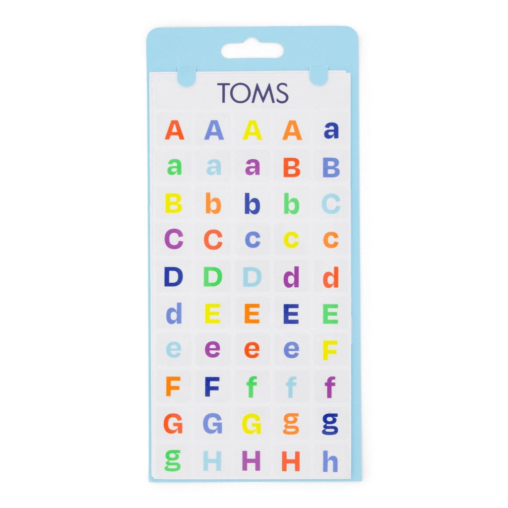 TOMS shoe tattoo colorful letter and number stickers up close detail shot