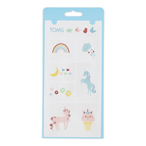 TOMS shoe tattoos with unicorn, rainbows and butterflies up close detail shot