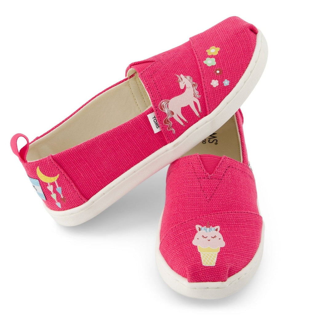 TOMS shoe tattoos on pink alpargata up close detail shot