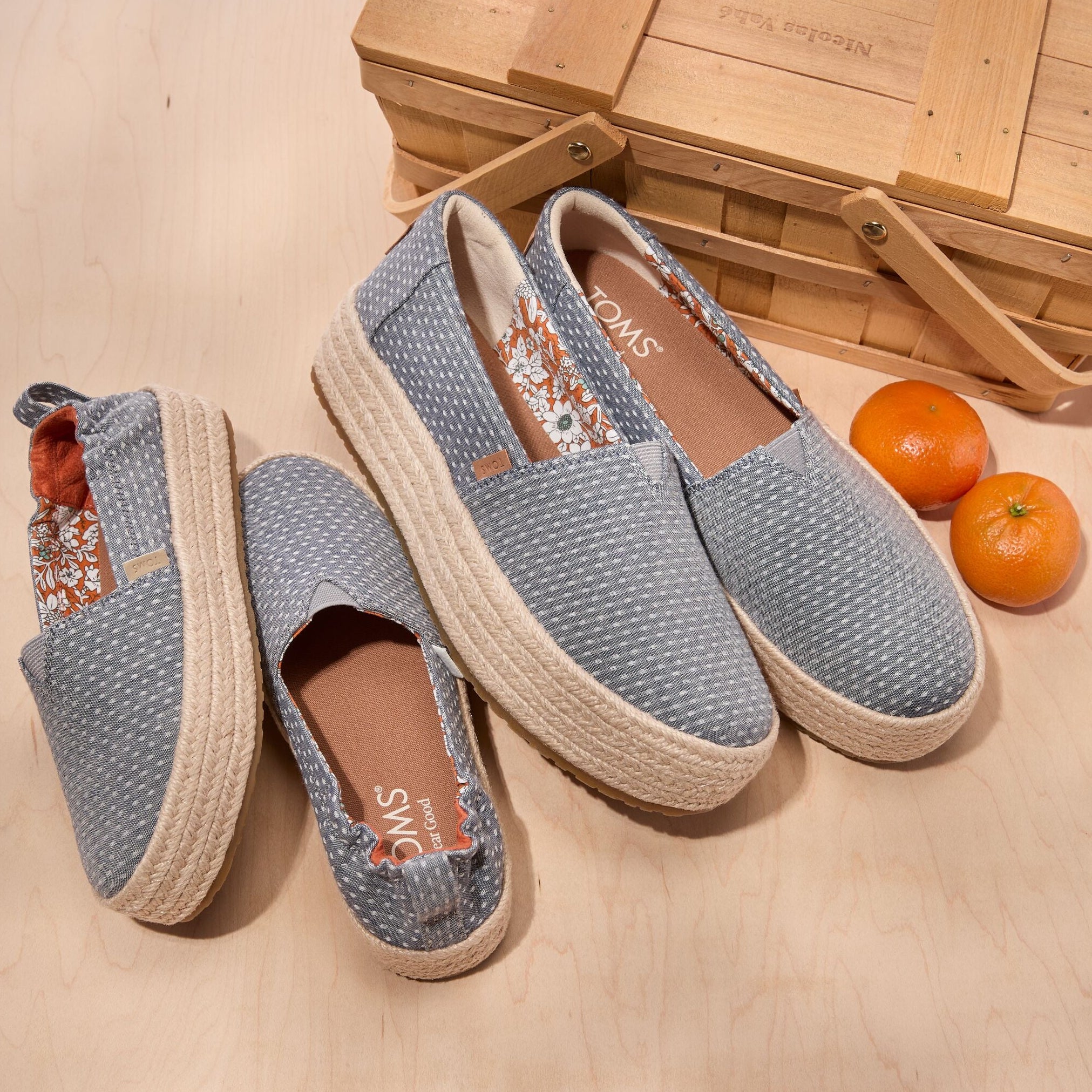 Laydown image of the blue chambray dot Valencia espadrille with the matching Kids Valencia