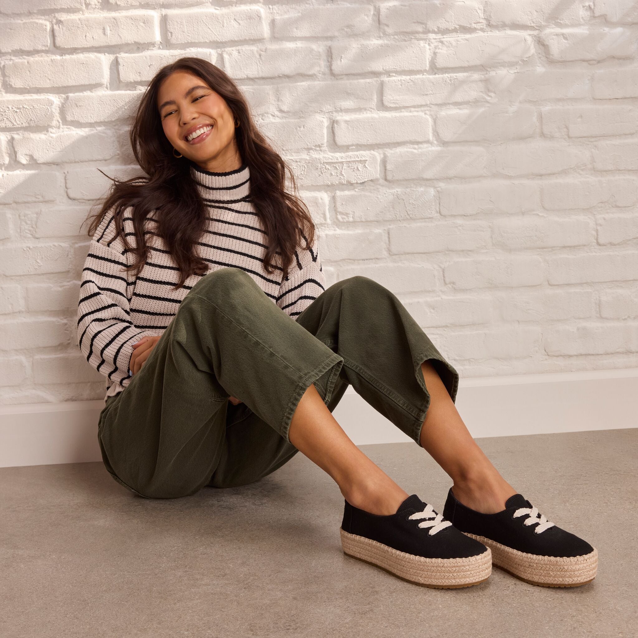 On model image of the black Valencia lace up espadrille