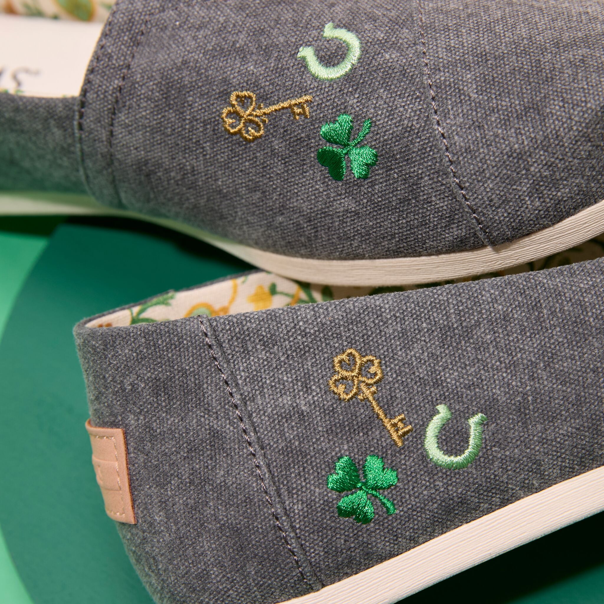 Up close detail image of the embroidered St. Patrick's Days chambray Alpargata 