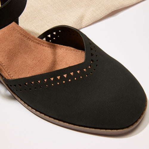 Close up detail image of the black perforated leather Jaclyn heel