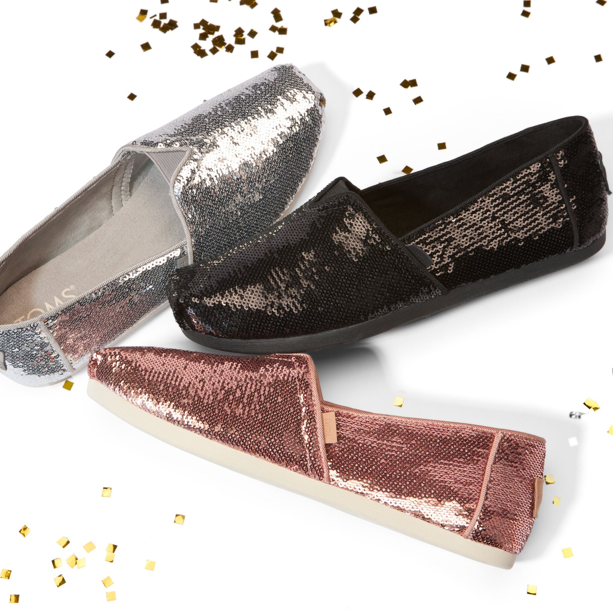 Laydown image featuring the black, silver and pink sequin alpargatas