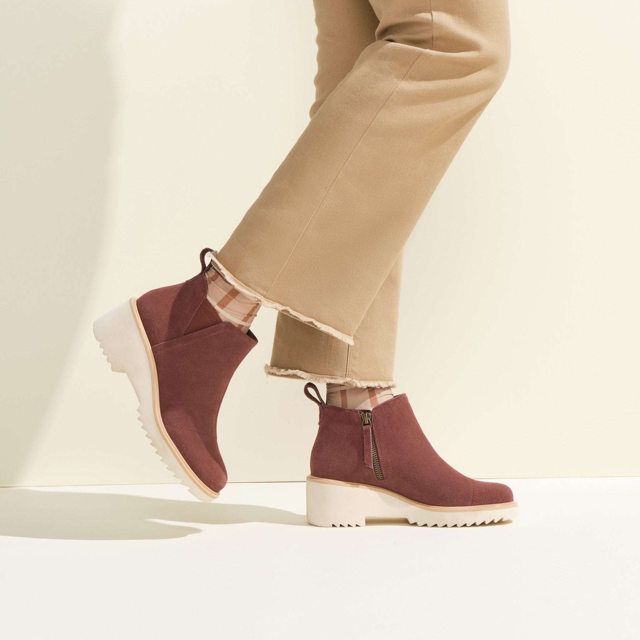 maude wedge boot in chestnut suede on model detail shot