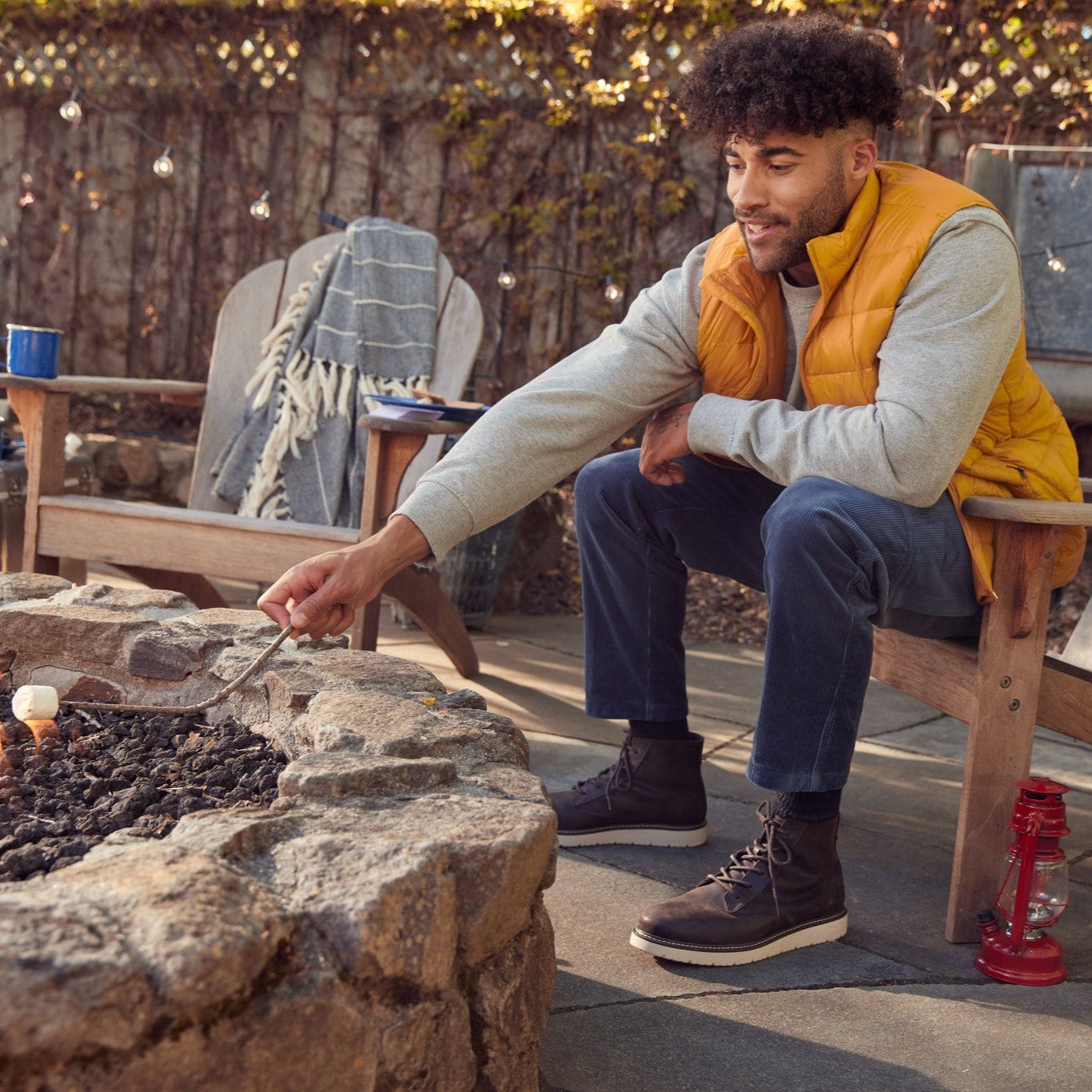 navi trvl lite ranger on model sitting by fire pit