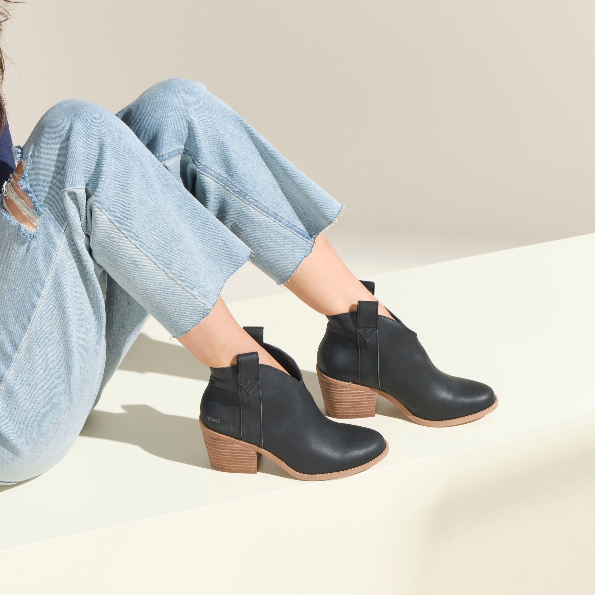 constance western inspired boot in black leather on model detail shot