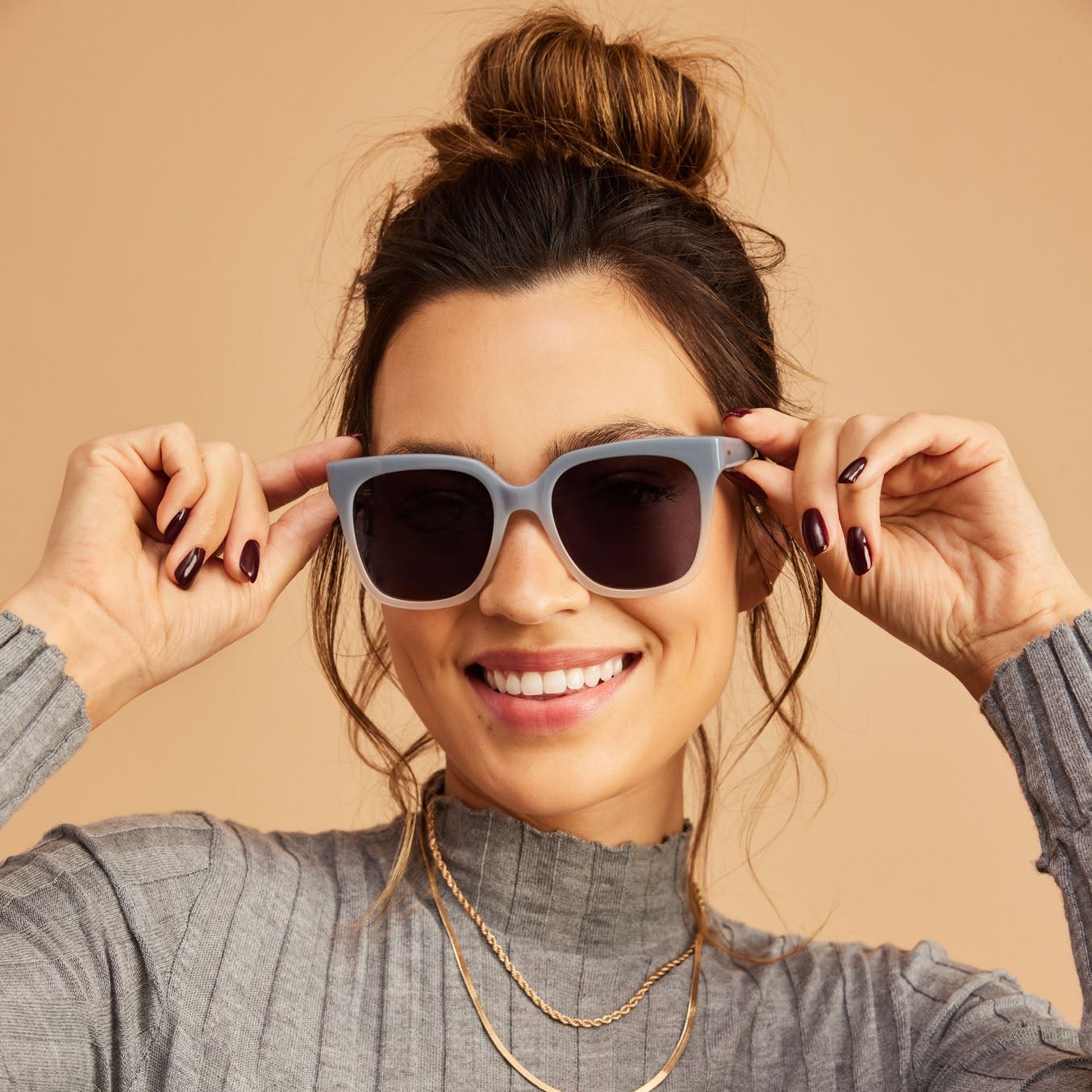 natasha chunky blue fade sunglasses on model detail shot