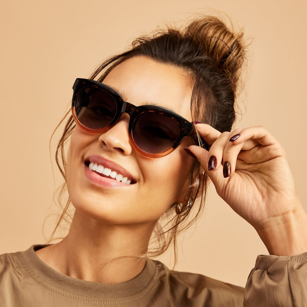 florentin travel women's sunglasses on smiling model up close detail shot