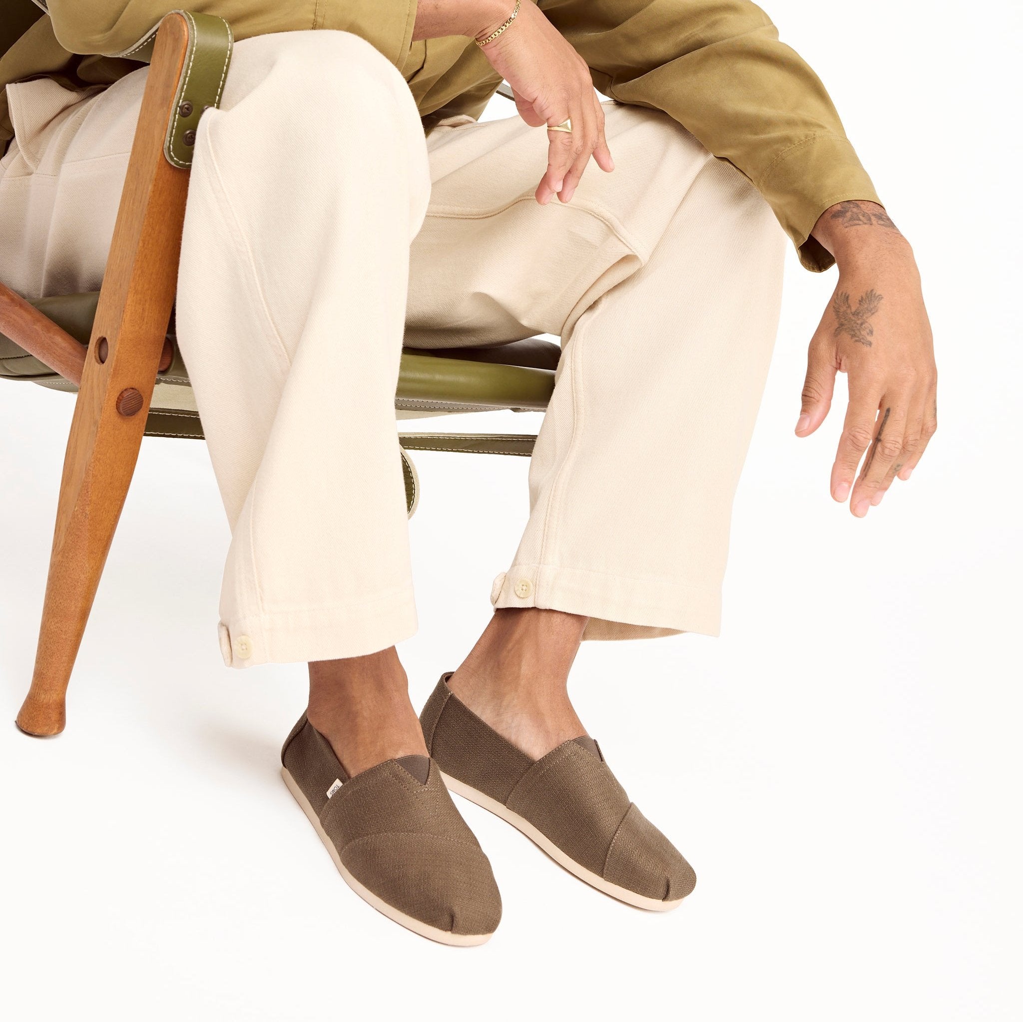 mens alpargata slip on casual shoe in green textile on model detail shot