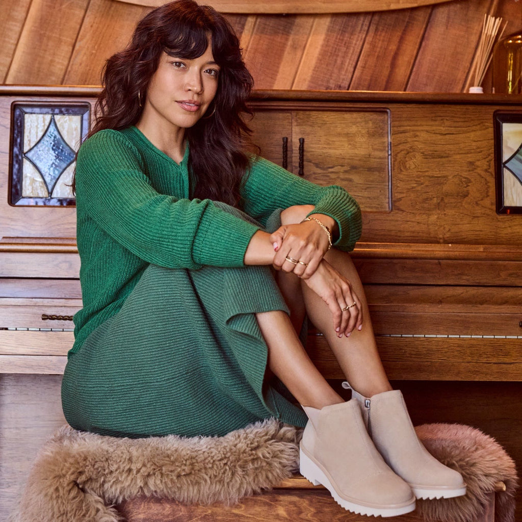 maude wedge boot in oatmeal suede on model