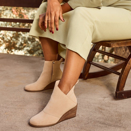 sutton wedge boot in oatmeal suede on model up close detail shot