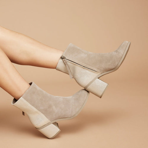 evelyn boot in dune suede with metallic heel up close on model detail shot