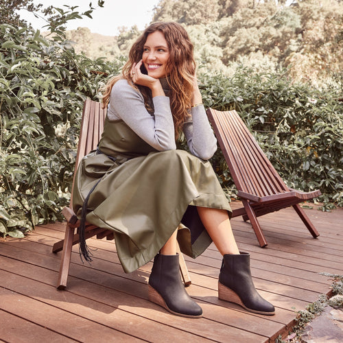 casey wedge boot in black leather on model 