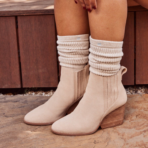 Noa chelsea wedge boot in natural suede on model up close detail shot