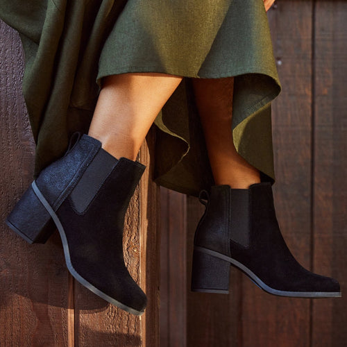 evelyn chelsea block heel boot on model up close detail shot