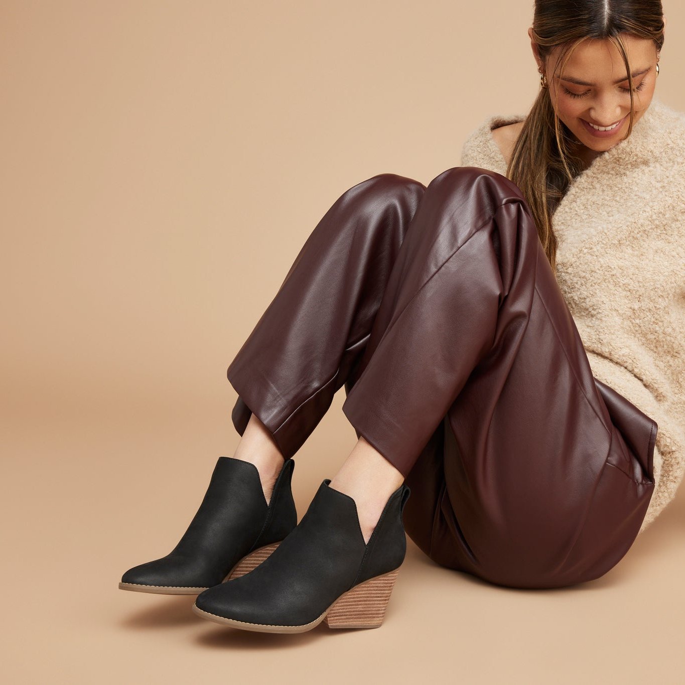 eliza wedge boot in black leather on model