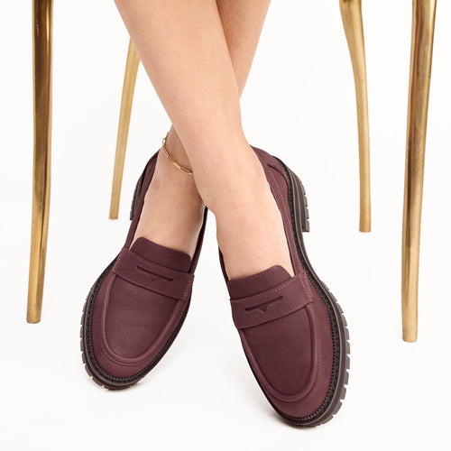 cara loafer in blackberry leather on model up close detail shot