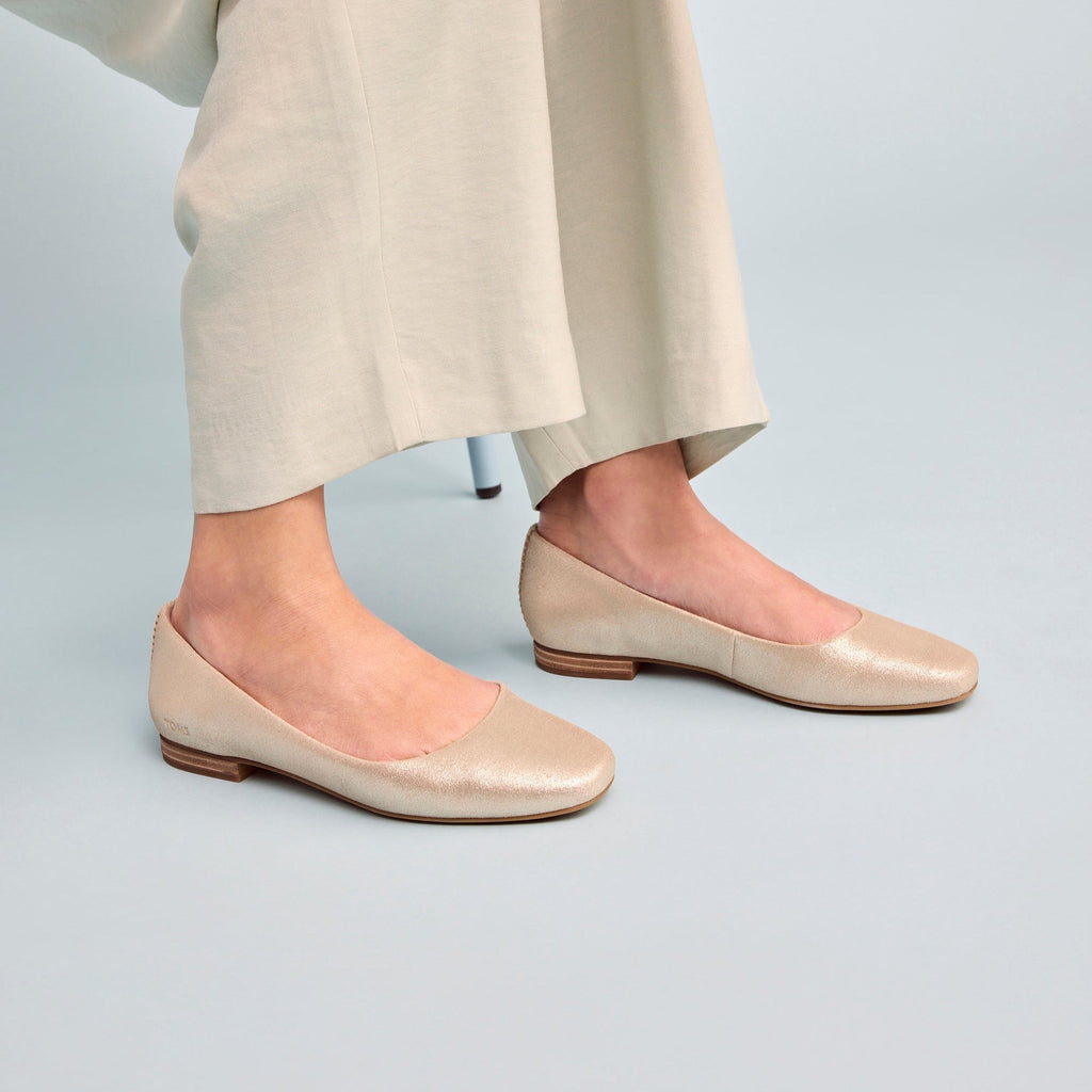 briella casual to dress flat in champagne metallic suede up close on model detail shot