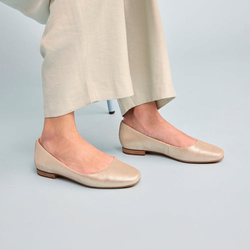 briella casual to dress flat in champagne metallic suede up close on model detail shot