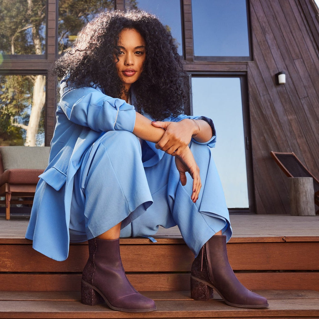 evelyn leather boot with brocade heel on model detail shot