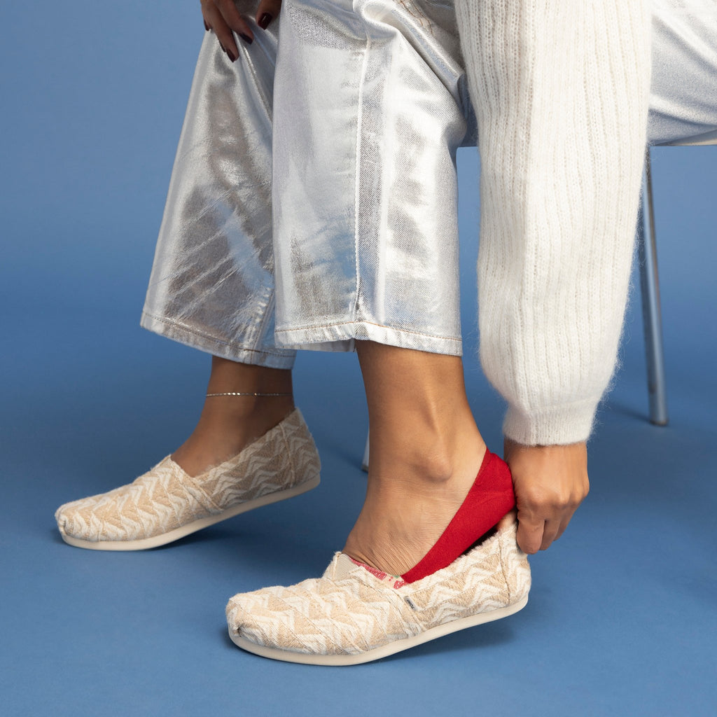 lifestyle image of holiday socks and alpargata 