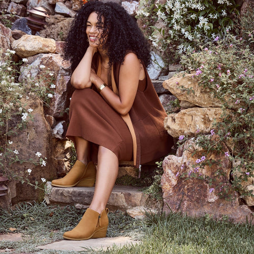 goldie ankle boot in brown leather on model styled in fall outfit