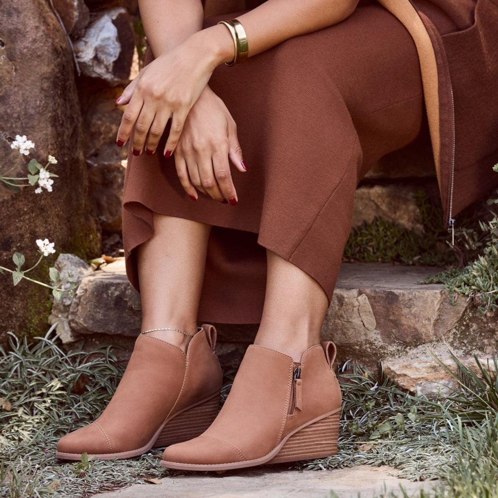 goldie wedge ankle boot in tan leather up close on model detail shot
