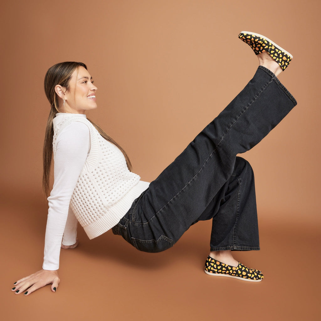 alpargata in candy corn print on model in fun pose