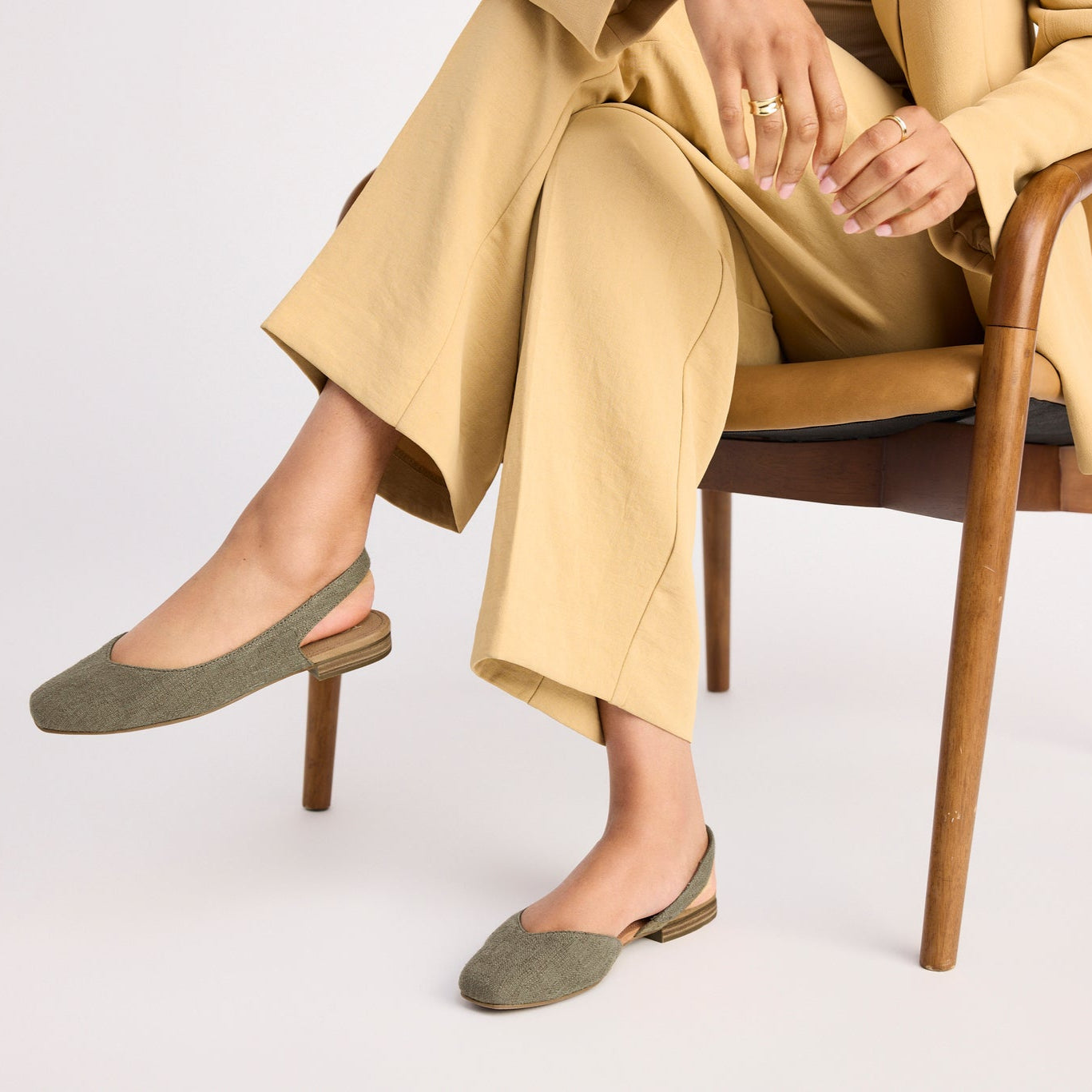 On figure image of the Alene olive slingback flat