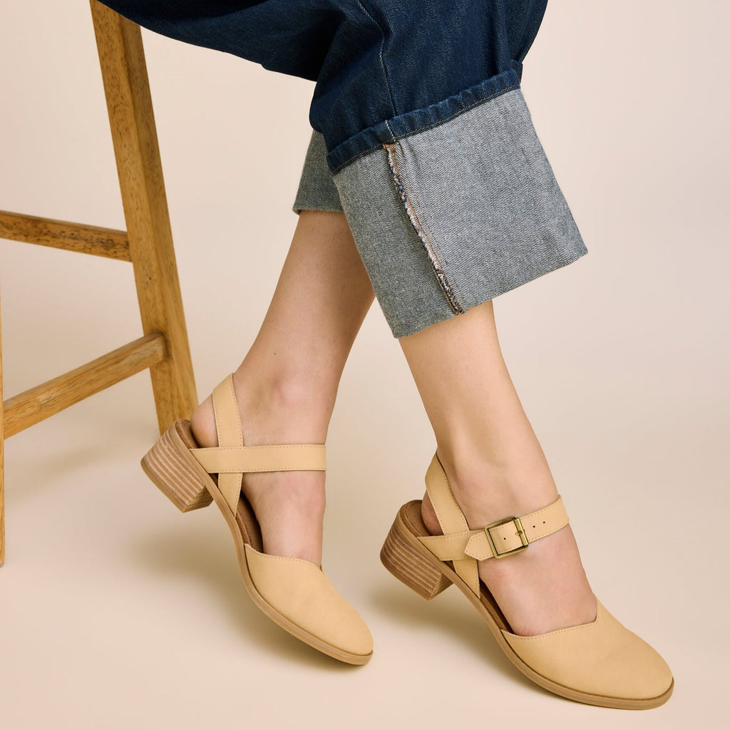 On figure image of the caramel nubuck leather Jaclyn heel
