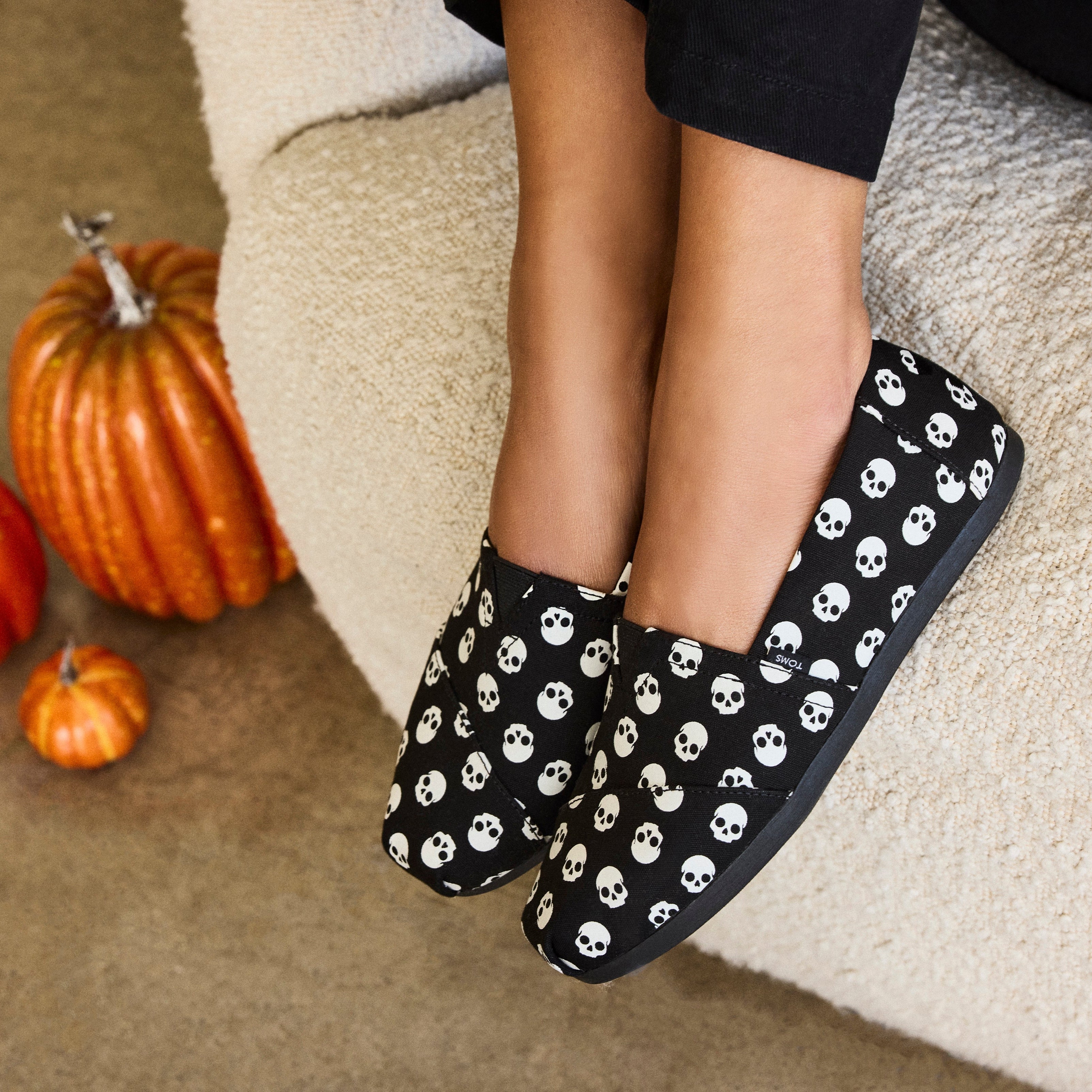 On figure image detail shot of the glow in the dark halloween skull alpargatas