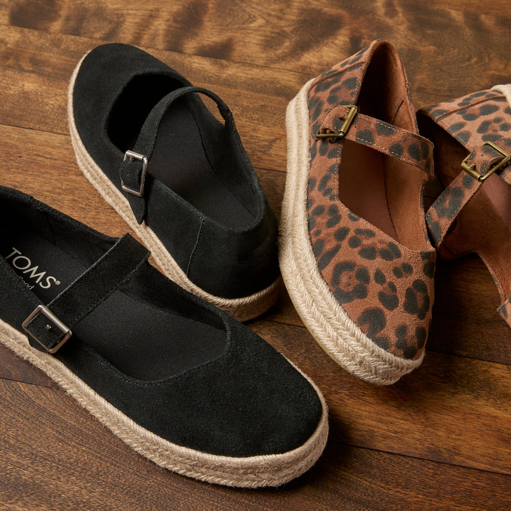 Laydown detail shot of the black suede Carolina Mary-Jane espadrille