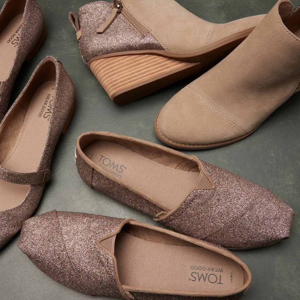 Laydown shot of the rainbow glitter alpargatas