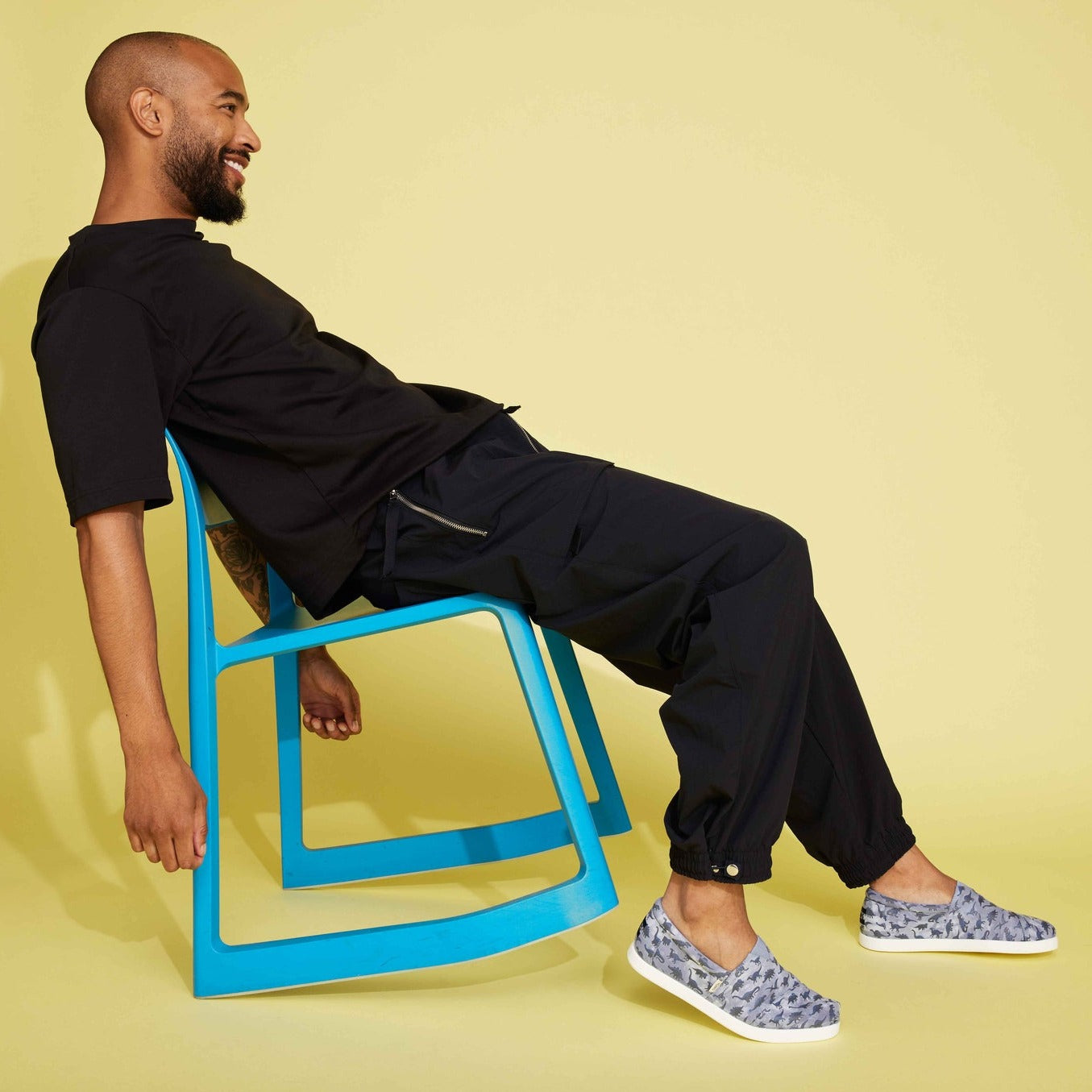 Men'S Dinosaur Alpargata Fwd On Model Sitting In Blue Chair