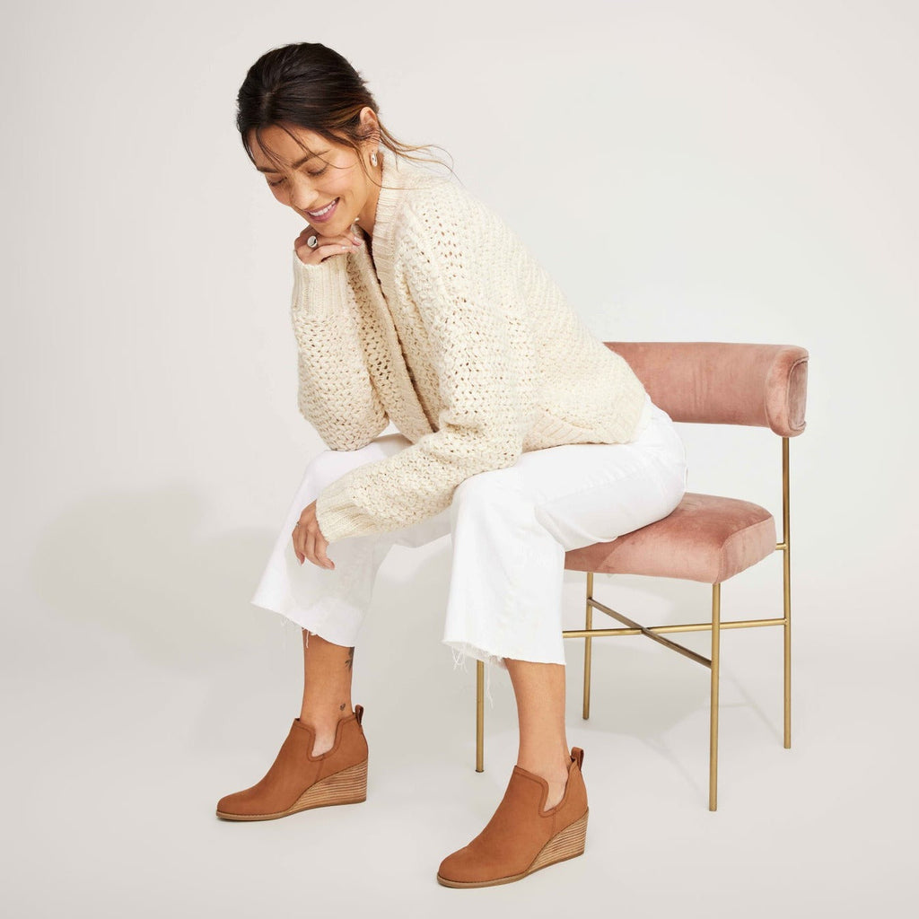 Kallie Leather Wedge Bootie In Tan Leather On Model