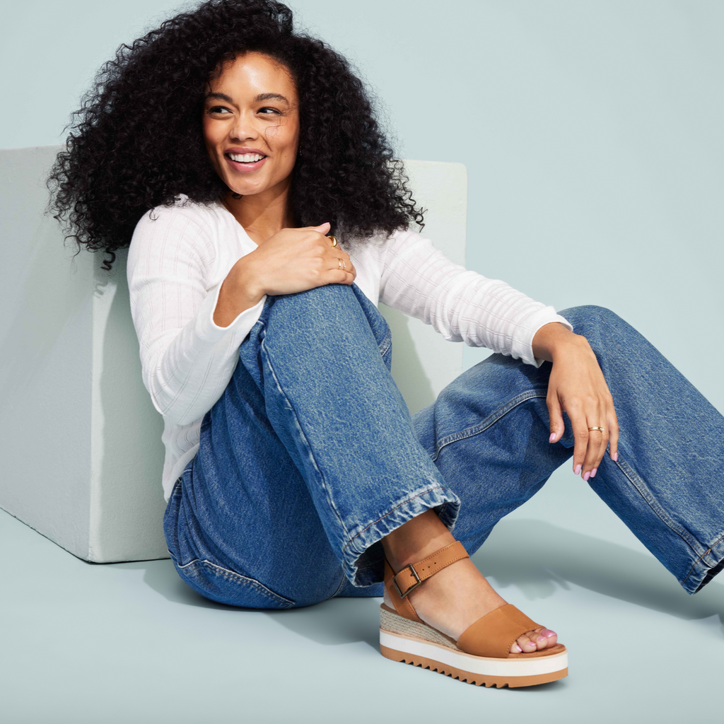 Diana Tan Leather Espadrille Sandal On Model Styled With White Shirt And Denim Wide Leg Jeans