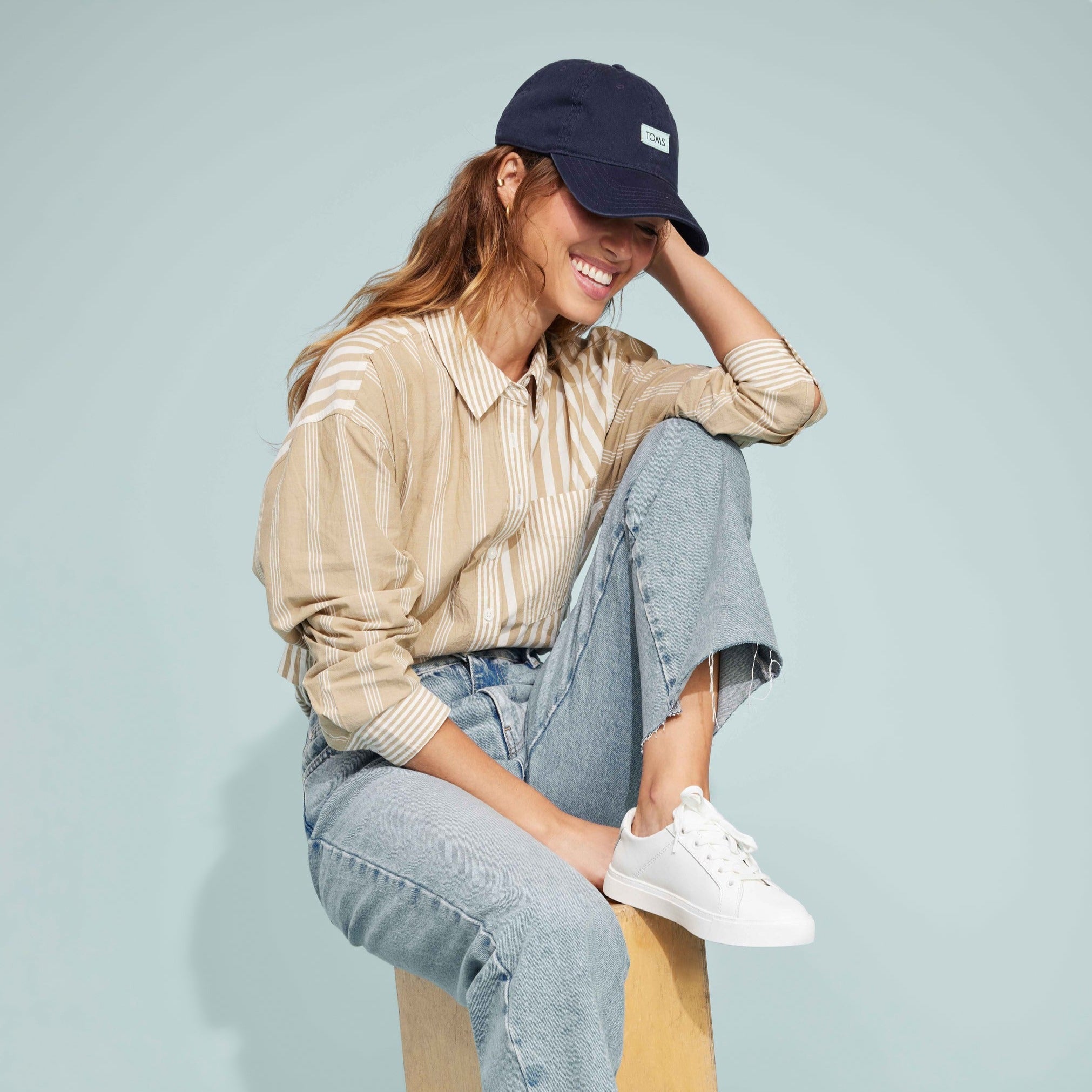 Kameron Lace Up Sneaker In White Leather On Model Styled Casually In Jeans