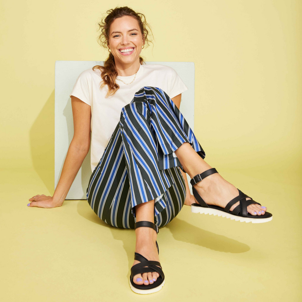 Rory Black Sandal On Model Relaxed Pose Smiling