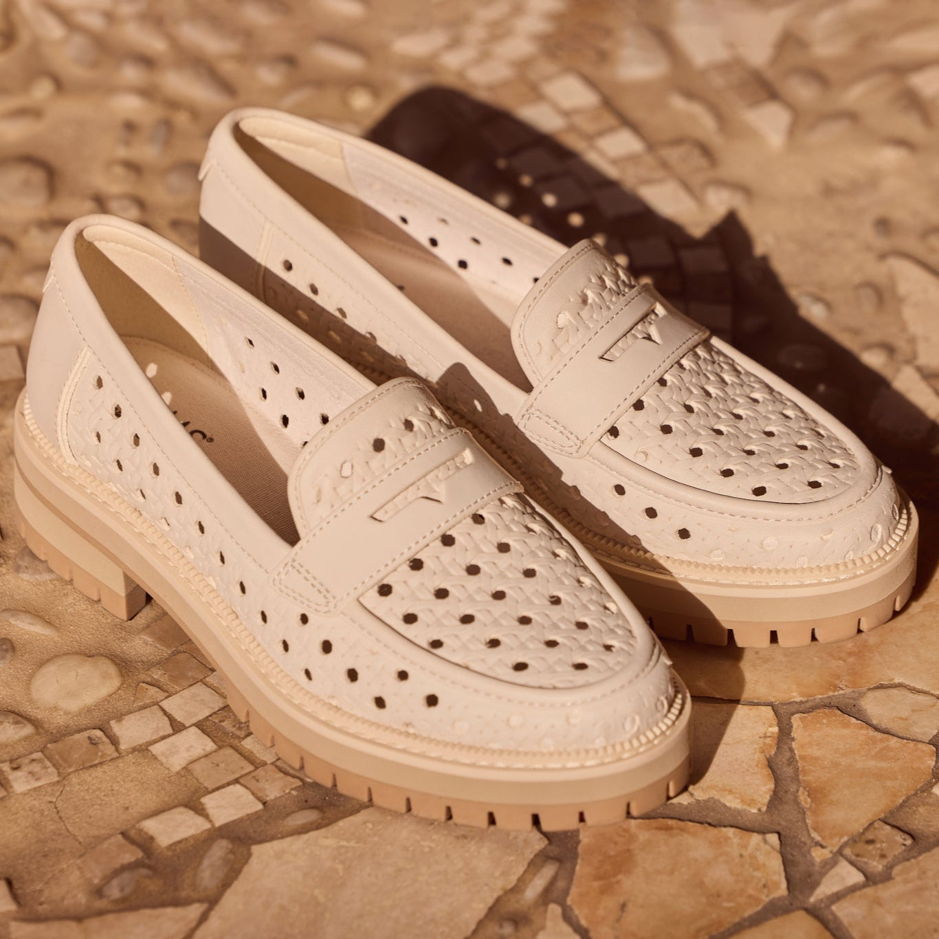 cara loafer in light sand perf up close detail shot