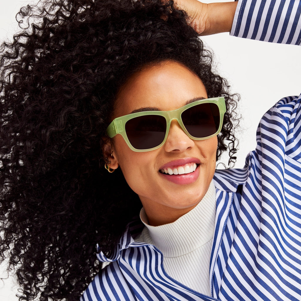 devon shiny green sunglasses on model up close detail shot