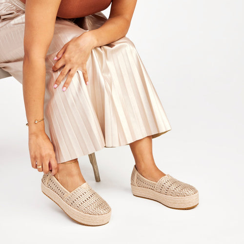 On figure image of the champagne metallic basket weave Valencia Espadrille