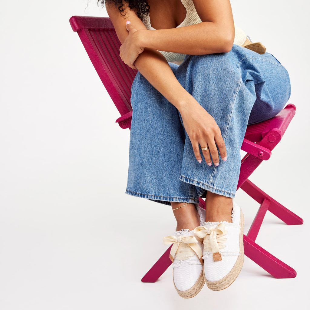 On figure image of the white beachside woven frayed lace up Carolina Espadrille