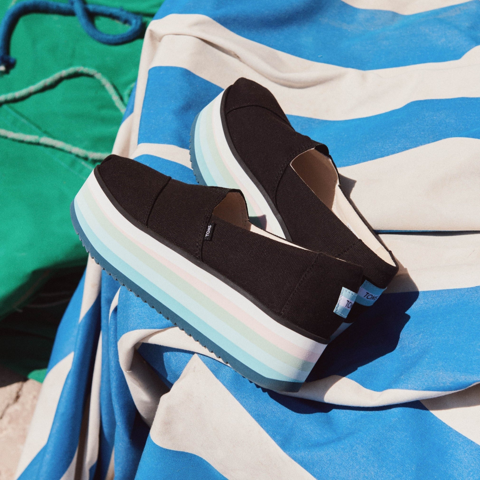 Alpargata Platform In Black Canvas With Blue Multi Stripe Up Close Laydown Shot