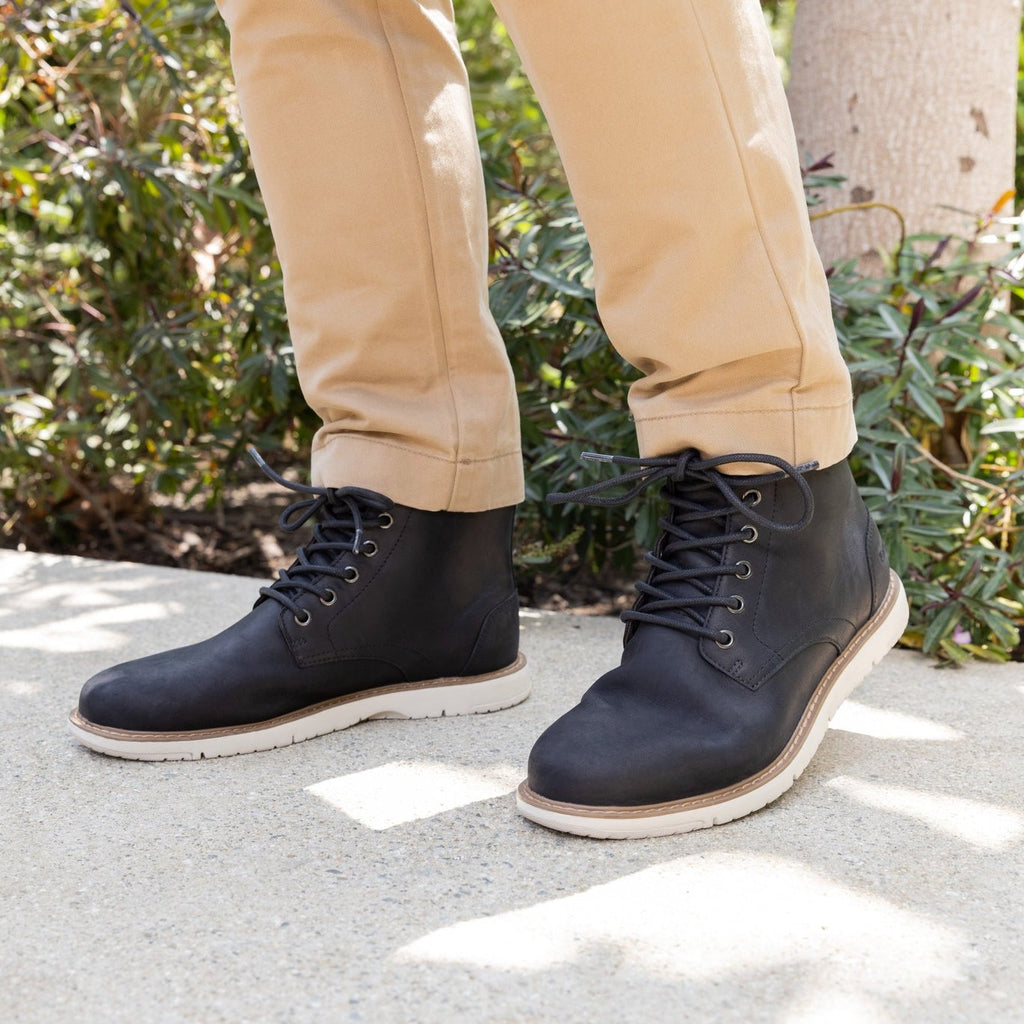 hillside water resistant boot in black leather on model up close detail shot