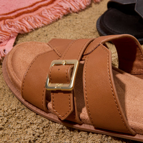 Up close detail image of the brown sugar Sol slide sandal