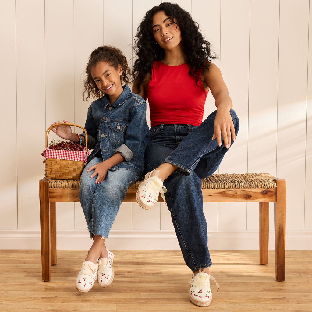 On model image of the Kids cherry Carolina lace up espadrilles with matching Women's Carolina lace up